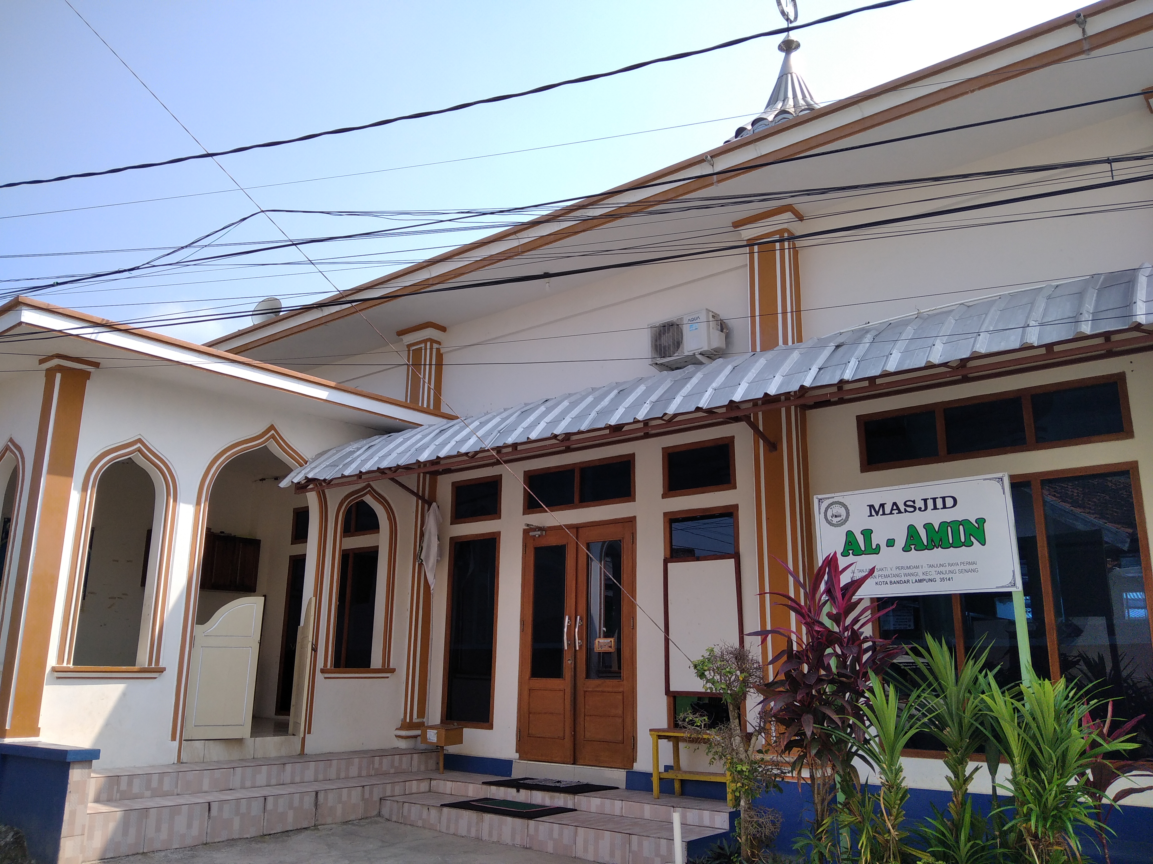 AL-AMIN